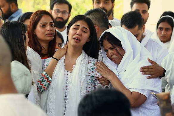 In Jaipur, the wife of accountant Neeraj Udhwani mourns during his last rites. He was killed in the terror attack in Pahalgam in April while the couple was on holiday. 
