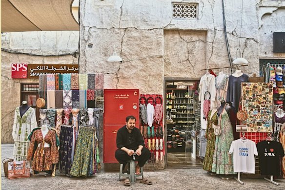 A shopkeeper at the empty al-Seef market, next to the historic Al Fahidi neighbourhood along Dubai Creek, one of the main tourist areas of Dubai on March 13.