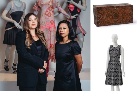 LACMA curators Michaela Hansen, left, and Clarissa Esguerra, with the Tibetan trunk and Scanners dress that were the beginnings of the Mind, Mythos, Muse exhibition.  