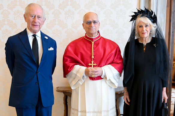 Britain’s King Charles III and Queen Camilla pose with Pope Leo XIV as they meet at the Vatican during a state visit.