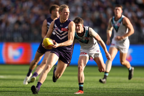 Hayden Young, pictured here in Sunday’s game, was unearthed as a midfield star in 2024 and is one of five Dockers in line for All Australian honours.