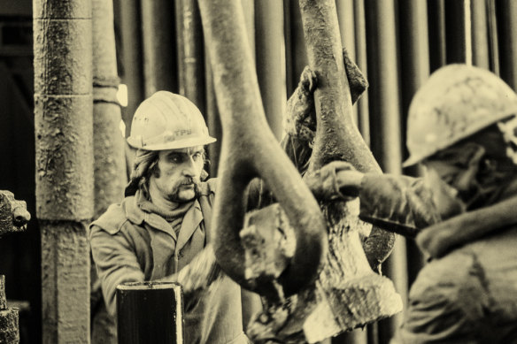 Workers in a petrol plant in Kazakhstan in 1990.