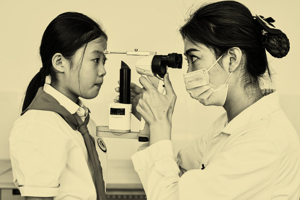 A student has her eyesight tested in east China’s Shandong province in 2023. Xi Jinping has vowed to combat widespread myopia. 