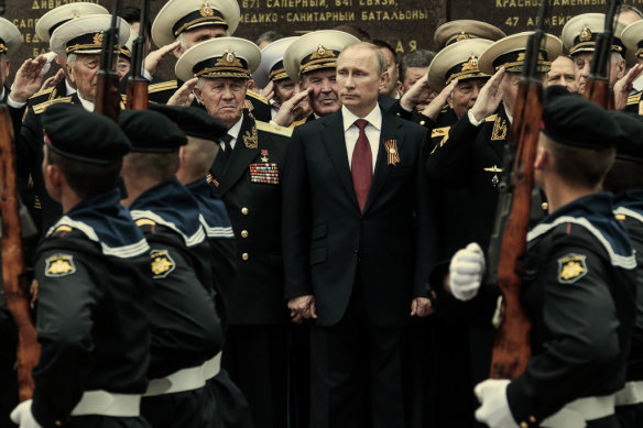Russian President Vladimir Putin attends a parade marking the Victory Day in Sevastopol, Crimea, on May 9, 2014. 