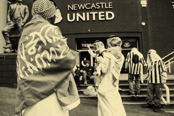 Fans of Newcastle United football club, including one draped in a Saudi flag, after the Gulf state’s takeover of the club in 2021.  