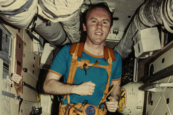 Australian-US astronaut Andy Thomas runs on a treadmill on the Mir Space Station in 1998.