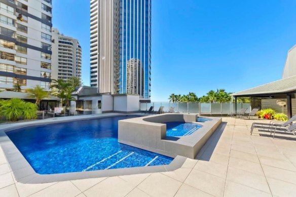 A father and grandfather from Victoria drowned at the Top of the Mark apartment building in Surfers Paradise on Sunday. 