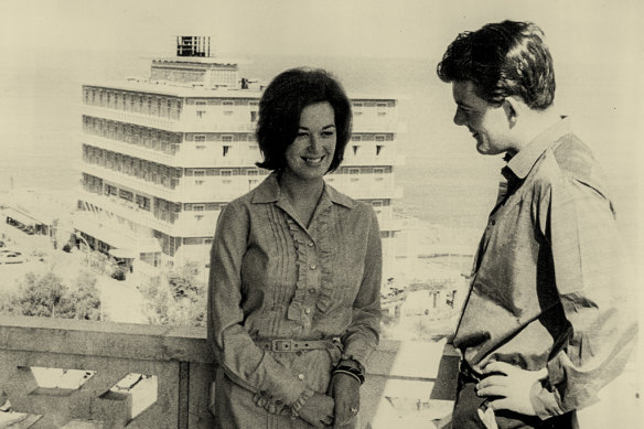 Diamond heiress Mary Oppenheimer and husband, rugby star Gordon Waddell, at the Beirut hotel Phoenicia with the St Georges hotel in the distance in 1965. 