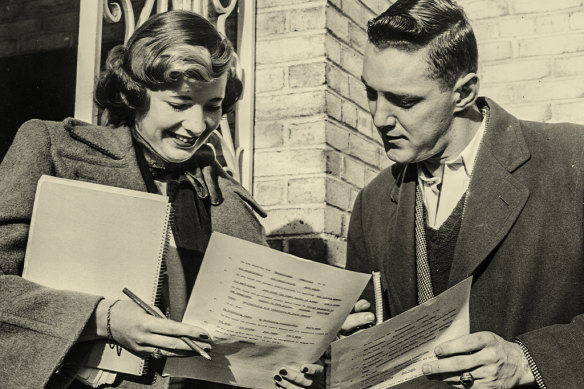 Two college students in New York fill out a Newsday survey about their voting intentions in the 1952 presidential elections. 