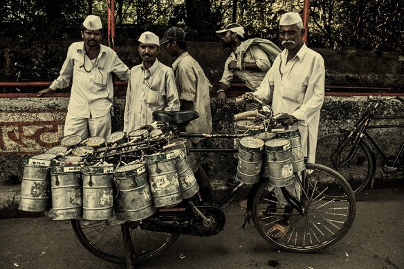 Mumbai’s dabbawalas work together to deliver 130,000 lunches every day. 