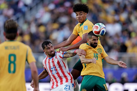 Herrington clears the danger against Paraguay.