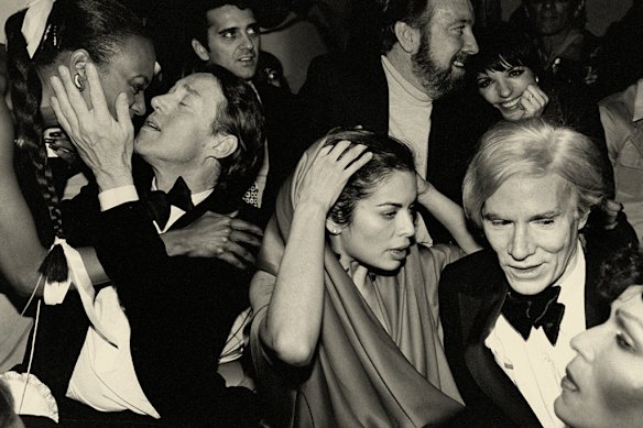The Silent Generation? Fashion designer Roy Halston (left) model Bianca Jagger (centre) artist Andy Warhol and singer Liza Minnelli behind him, on New Year’s Eve in 1978 at nightclub Studio 54.