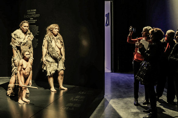 A museum exhibit with (from left) a Homo floresiensis, a Homo sapiens and a Neanderthal woman in a science and anthropology museum in Lyon, central France, in 2014.