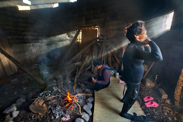 An ama free-diver carries on a 2000-year tradition as she prepares for a dive.