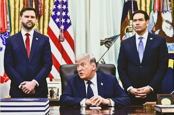  Donald Trump flanked by Vance and Marco Rubio in the Oval Office of the White House in Washington in April.  

