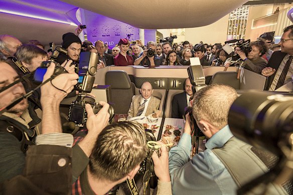 The unveiling of Qatar Airways seats that can be docked together, at a travel fair in Germany in 2017.
