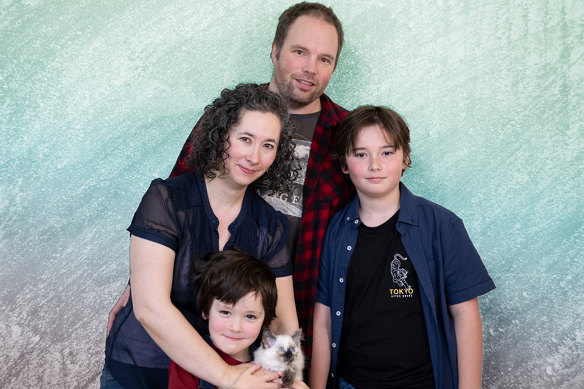 Elissa McKay and husband Jon Bentley with Rowan Bentley (holding their new kitten, Solaris) and Finn.