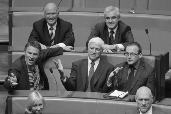 Independent MPs Tony Windsor and Andrew Wilkie, top row, Rob Oakeshott, Bob Katter and Greens MP Adam Bandt held the balance of power Labor formed a minority government under the helm of Julia Gillard in 2010.