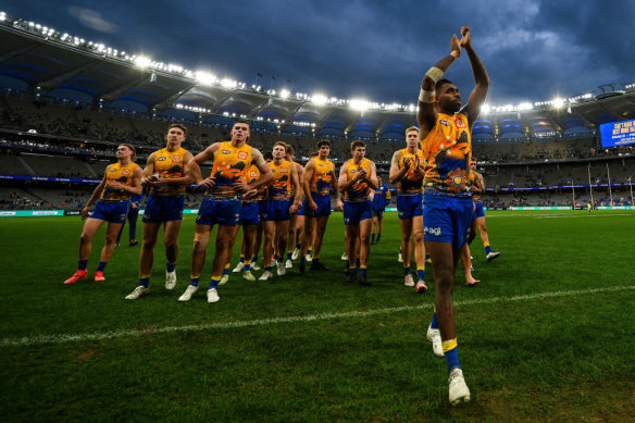 Ryan leads the team into the rooms during Sunday’s match. 