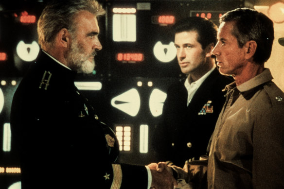 Sean Connery, as the rogue commanding officer of a Soviet submarine, in a scene from the 1990 film The Hunt For Red October with co-stars Alec Baldwin and Scott Glenn.