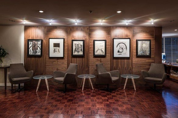 Artworks on a lobby wall.