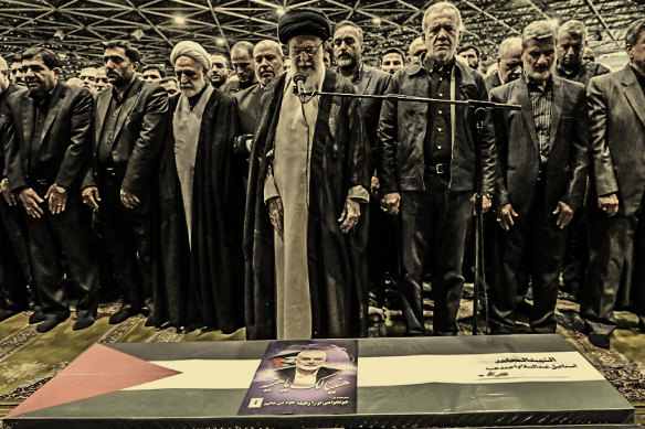 Iran’s leader, the Ayatollah Ali Khamenei, centre, leads a prayer over the coffin of Hamas leader Ismail Haniyeh, killed by a bomb in Tehran in July.