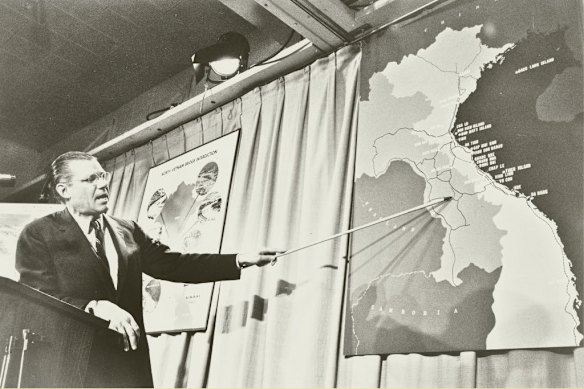 In 1964, US secretary of defence Robert McNamara shows where US Navy aircraft made strikes on North Vietnam.