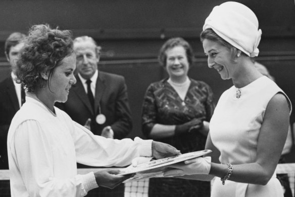 Evonne Goolagong is presented with the Venus Rosewater Plate by Princess Alexandra after the 1971 Wimbledon final.