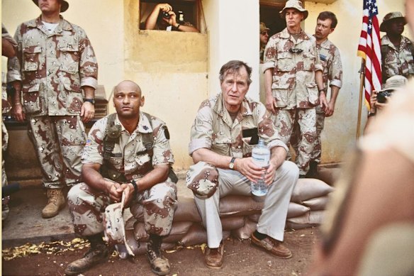 US president George H. W. Bush visits US forces in Somalia just a month before the disastrous death of 18 soldiers in Mogadishu in October 1993.