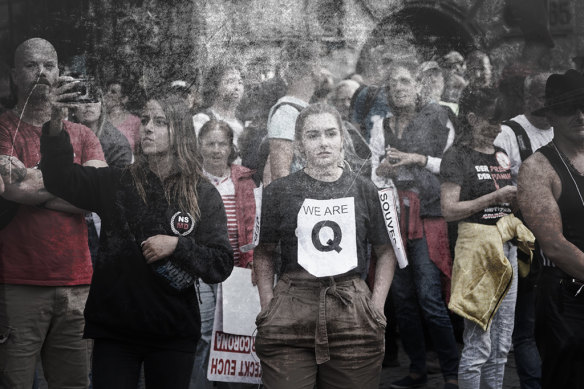 A young woman wearing a QAnon shirt during protests against COVID-19 restrictions on August 29 in Berlin.