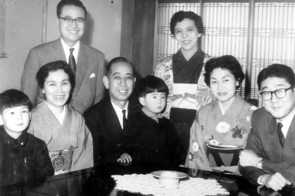 Prime Minister Nobusuke Kishi with Yoko Abe, Shintaro Abe and grandson Shinzo Abe (centre). 