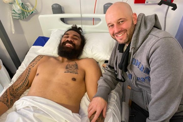 NRL chief executive Todd Greenberg visits Mose Masoe at Pinderfields Hospital in Wakefield in February.