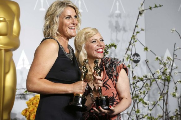 Beverley Dunn and Catherine Martin with their Oscars for best art direction for The Great Gatsby.
