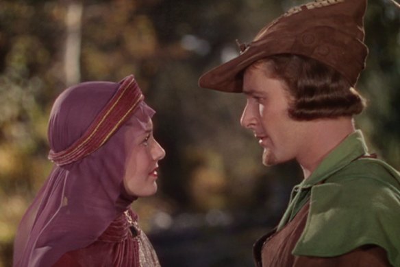 Patricia O’Brien tells the real story of Errol Flynn, seen here with Olivia de Havilland in The Adventures of Robin Hood.