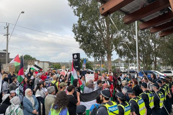 Pro-Palestine protesters stand outside Coburg Town Hall in Melbourne’s northern suburbs.