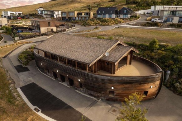 Windows in the lower storey look like portholes.