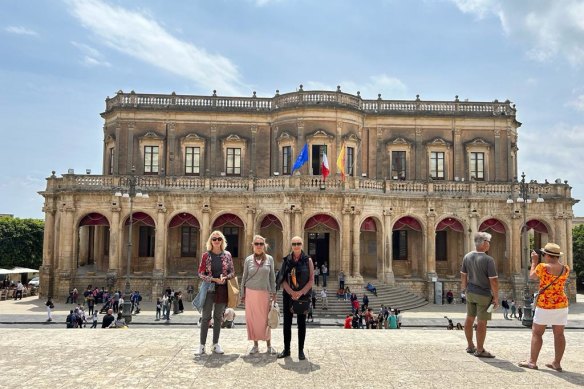 The writer (left) with two of her sisters in the baroque town of Noto in south-east Sicily.