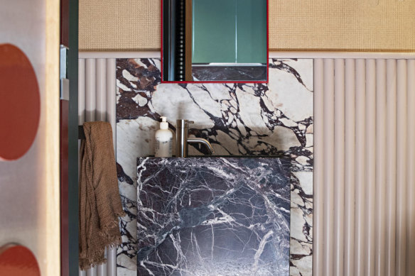 The colourful powder room is one of Slater’s favourite spaces. 