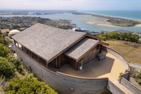 The Christchurch building is clad in timber with a quaint pitched roof.