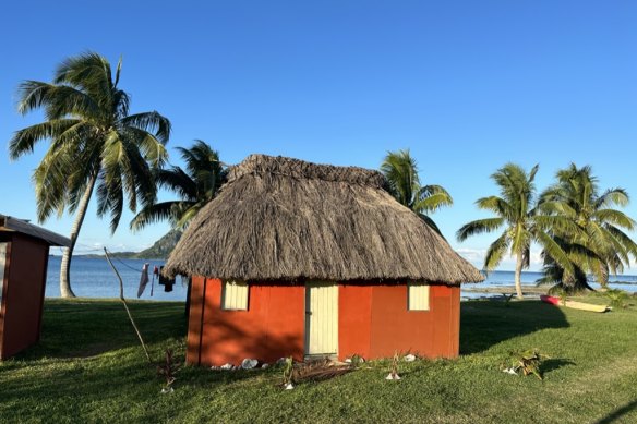 Our accommodation is in a one-room, bright orange thatched bure on the beach.