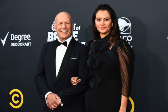 Bruce Willis and wife Emma Hemming Willis. “Give him the space. Allow for our family or whoever’s with him that day to be able to get him from point A to point B safely,” she said on social media.