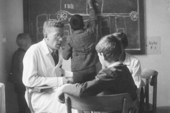 Hans Asperger with a child patient.