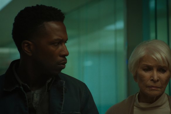 Leslie Odom jnr and Ellen Burstyn in iThe Exorcist: Believer/i, directed by David Gordon Green.