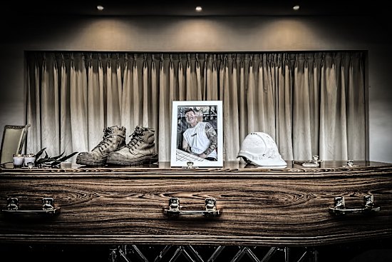 Ben Nash’s coffin at his funeral where his love of construction was clear.