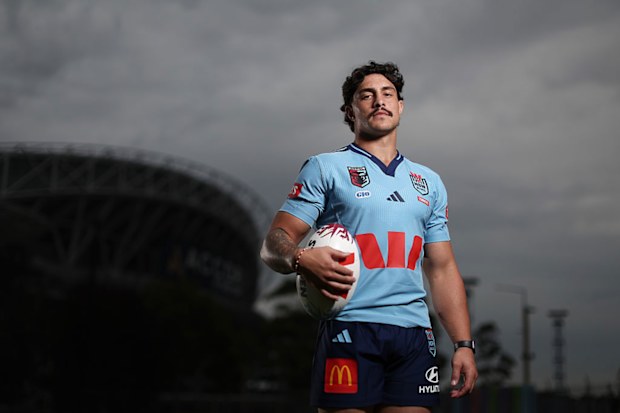 Kotoni Staggs poses in the NSW Blues jersey.