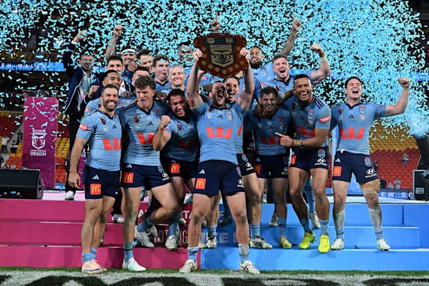 NSW Blues celebrate their Origin series victory.