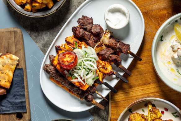 Skewer medley with batata bi kizbara and cheese sambousek from Al Aseel in Liverpool.
