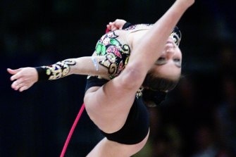 Alina Kabaeva in action as a gymnast.