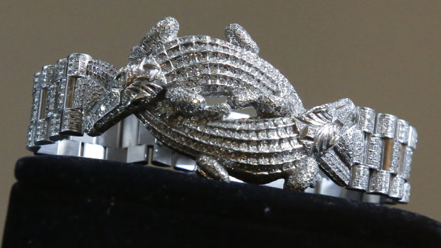 A men's bracelet made of 18K white gold and featuring two crocodiles entwined and covered with 1331 diamonds that featured in the auction.