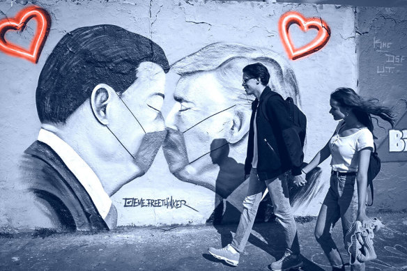 In Berlin, graffiti shows masked presidents Xi Jinping and Donald Trump, who are now locked in a war of words over the outbreak.